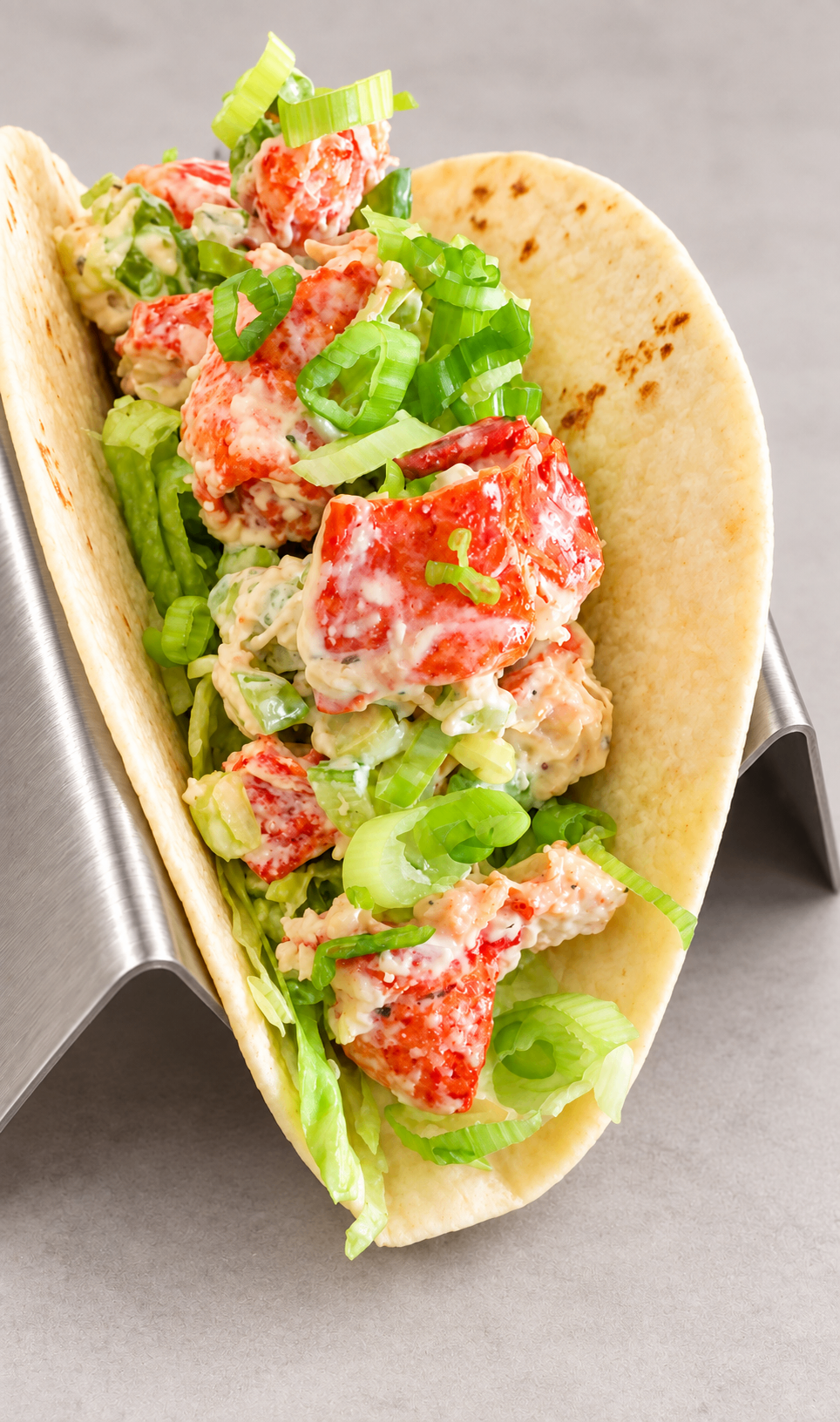 New England lobster taco with celery, scallion and lettuce at The Taco 105