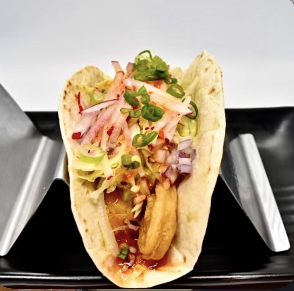 Bangkok crispy calamari taco with radish and sweet chili sauce at The Taco 105